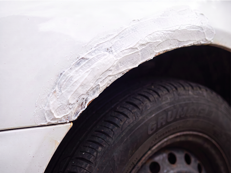 Rust repair paste curing on the car panel