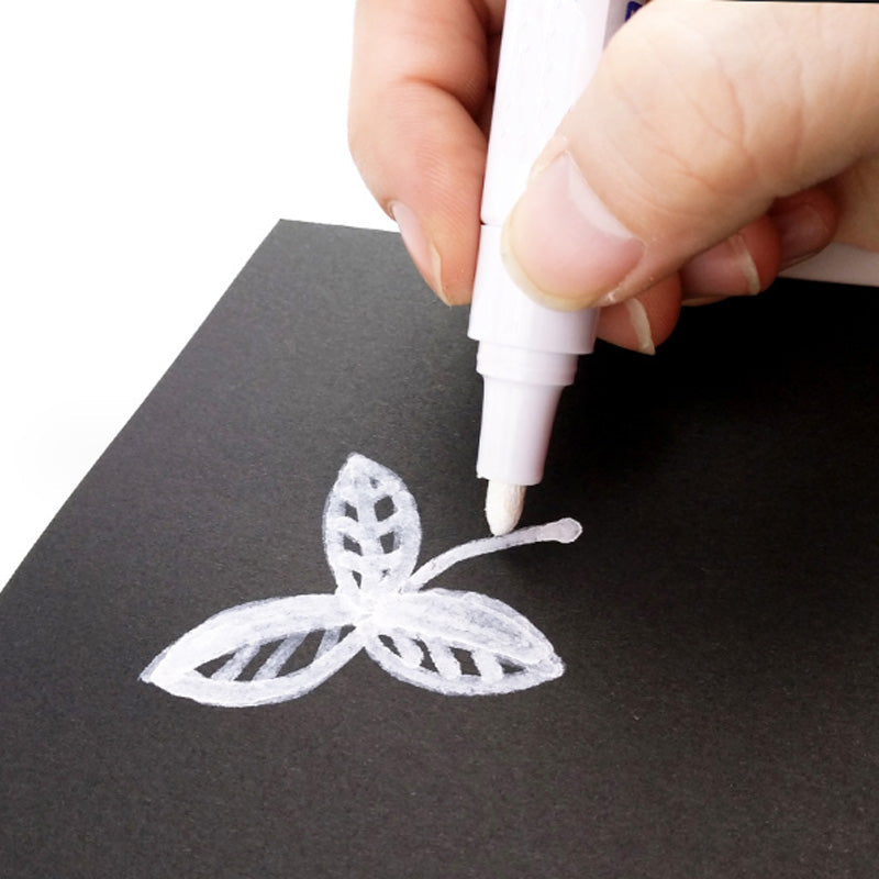Quick-drying paint marker creating clean lines